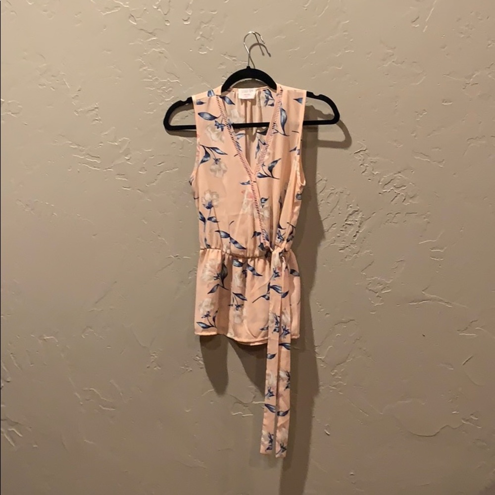 Floral sleeveless peach blouse